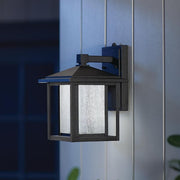 Mauvo Canyon 11 in. Black Dusk to Dawn Small LED Outdoor Wall Light Fixture Porch Sconce with Seeded Glass