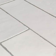 Cotton Blossom White 2.5 in. x 9.75 in. Glossy Textured Ceramic Wall Tile (5.38 sq. ft./Case)