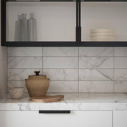 Glossy Ocean Carrara White 4 in. x 12 in. Glossy Ceramic Wall Tile (0.322 sq. ft./Each)